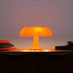 Lampe champignon à poser orange allumée